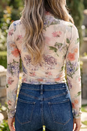 Floral sheer long sleeve maternity shirt with a high neckline.