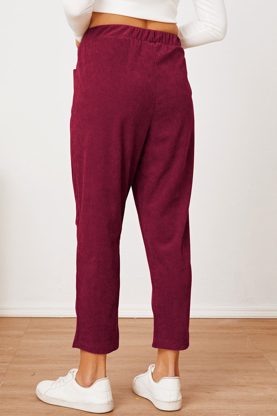 Corduroy barrel-leg utility pants in Scarlet with elastic waist and pockets.