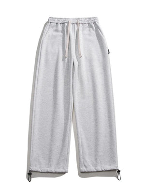 Light gray cotton sweatpants with drawstring waist and adjustable ankle cuffs.