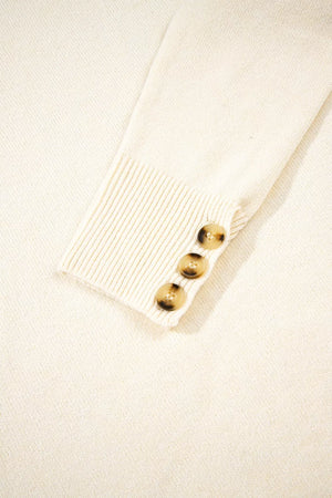 Button-cuff Crew Neck Sweater in White with decorative buttons