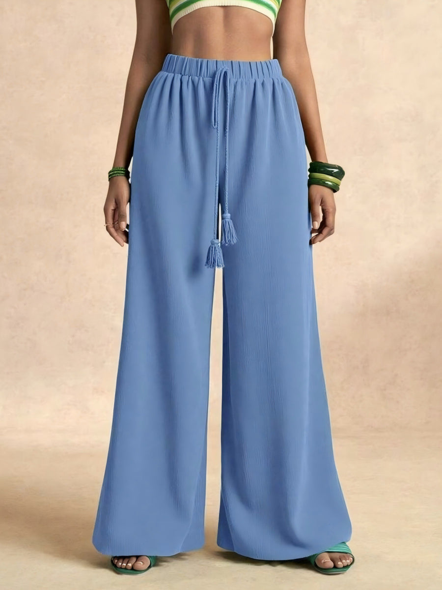 100% polyester Care instructions: Machine wash cold wide-leg pants in Black with flared silhouette