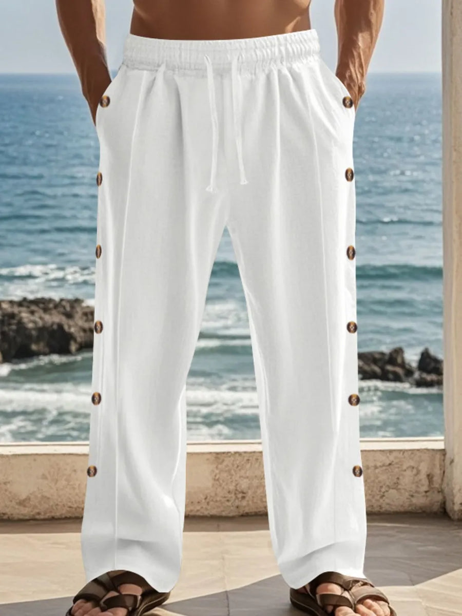 White linen palazzo trousers with side buttons and drawstring waist