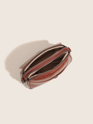 PU Leather Crossbody Bag With Metal Emblem in cognac