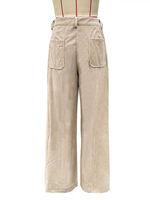 Chic wide-leg corduroy trousers in apricot with patch pockets and a comfortable fit.