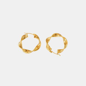 Textured spiral gold hoop earrings with a twisted design and dotted pattern.