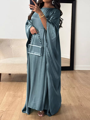 Deep teal kimono sleeve maxi dress with a flowy silhouette and elegant sheen.