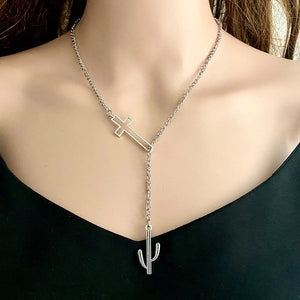 Silver asymmetrical cross lariat necklace with cactus charm, alloy material.