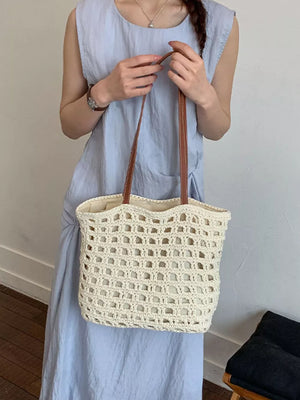 cream handbag with medium and drawstring