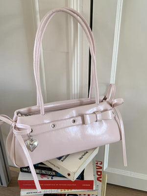 Pink patent PU leather shoulder bag with bow details and heart charm