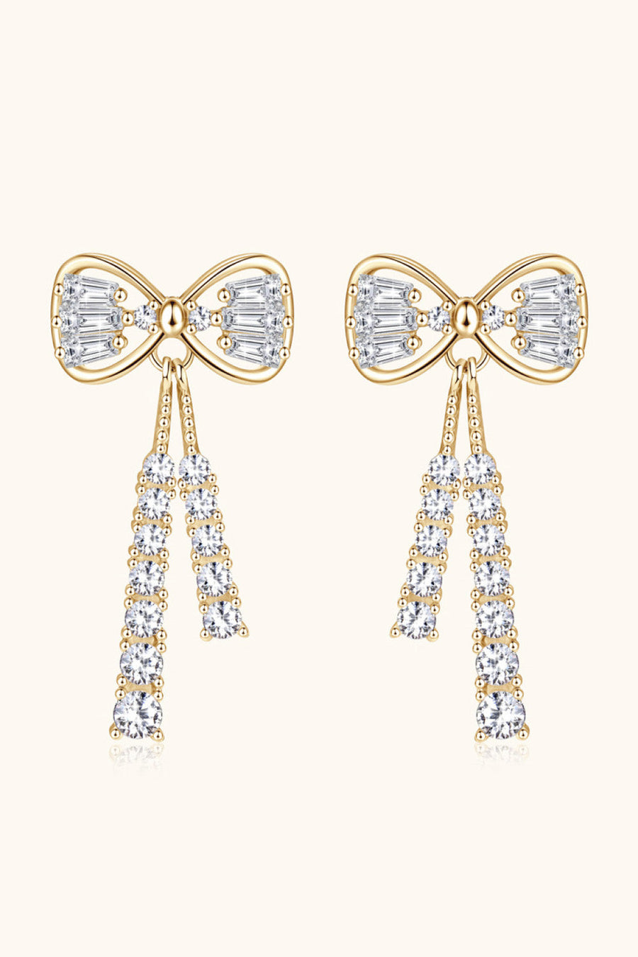 Gold baguette bow drop earrings with crystal tassels