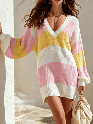 95% polyester, 5% elastane Care instructions: Machine wash cold sweater dress in white with relaxed silhouette