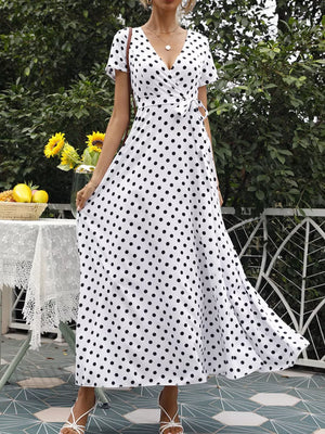 white wrap dress with polka dot and v-neck