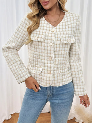Apricot tweed jacket with pearl trim and button front, featuring a V-neck and chest pockets.