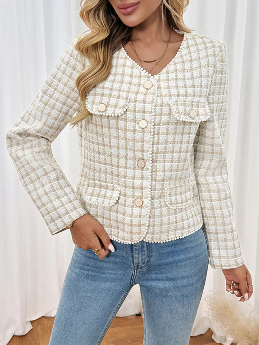 Apricot tweed jacket with pearl trim and button front, featuring a V-neck and chest pockets.