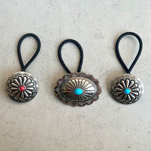 Southwestern hair ties with alloy medallions in Style B aqua and Style C red accents.