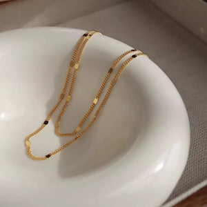 gold necklace with collar and clasp