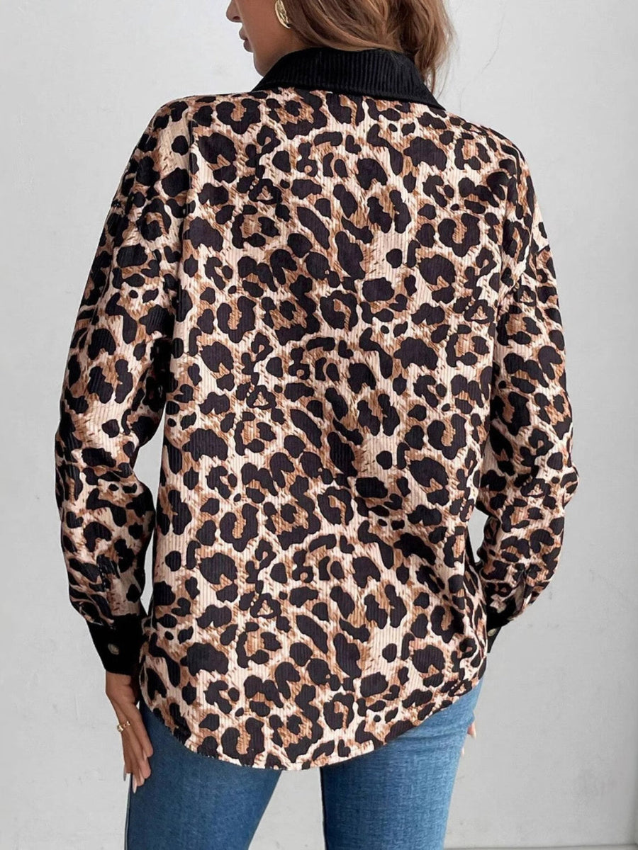 Leopard print corduroy utility shirt jacket with black collar and cuffs.