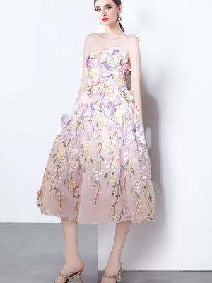 Luxe floral applique midi dress in purple pink with 3d flowers and sheer neckline.