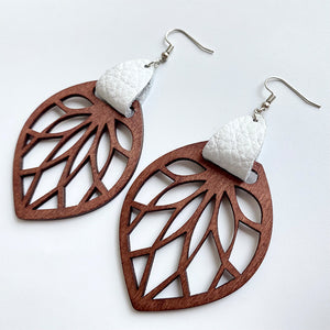 Brown wood leaf cutout earrings with white textured top