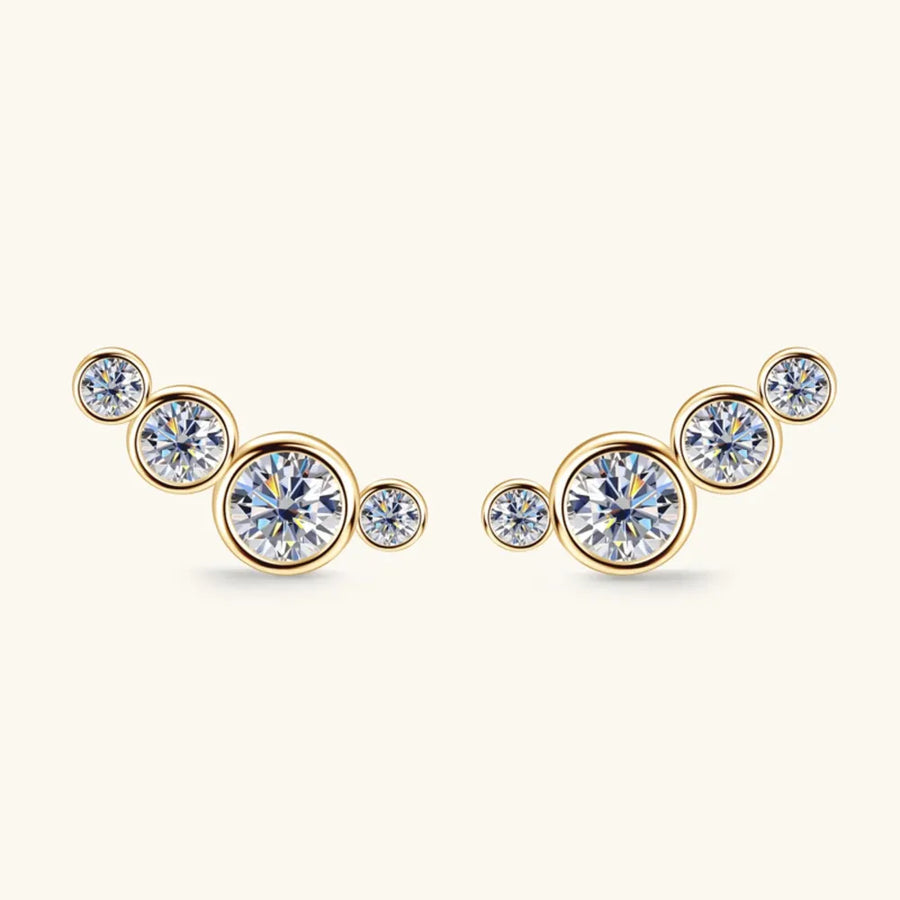 Gold ear climbers with a cluster of five round clear crystals on each earring.