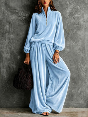 two-piece set in baby blue featuring zipper and relaxed fit