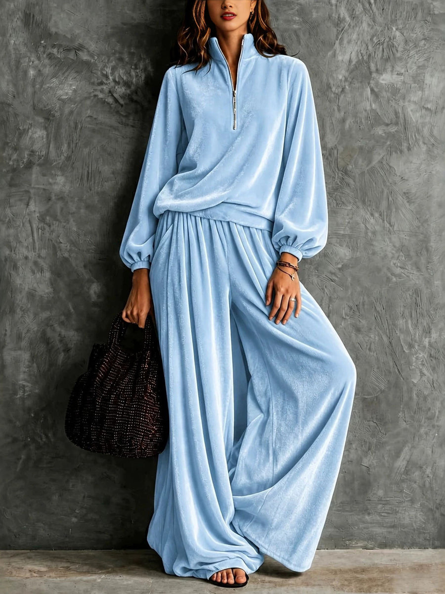 two-piece set in baby blue featuring zipper and relaxed fit