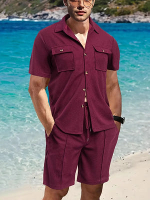 Burgundy textured resort shirt with two chest pockets and matching drawstring shorts.