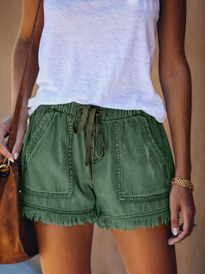 Full Size Drawstring Frayed Hem Denim Shorts in light blue with raw hem