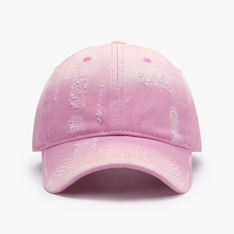 Distressed blush pink cotton baseball cap with frayed details