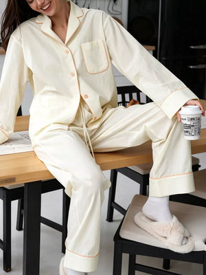 pajama set in ivory featuring buttoned and relaxed fit