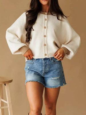 100% polyester Care instructions: Machine wash cold cardigan in Ivory with relaxed silhouette