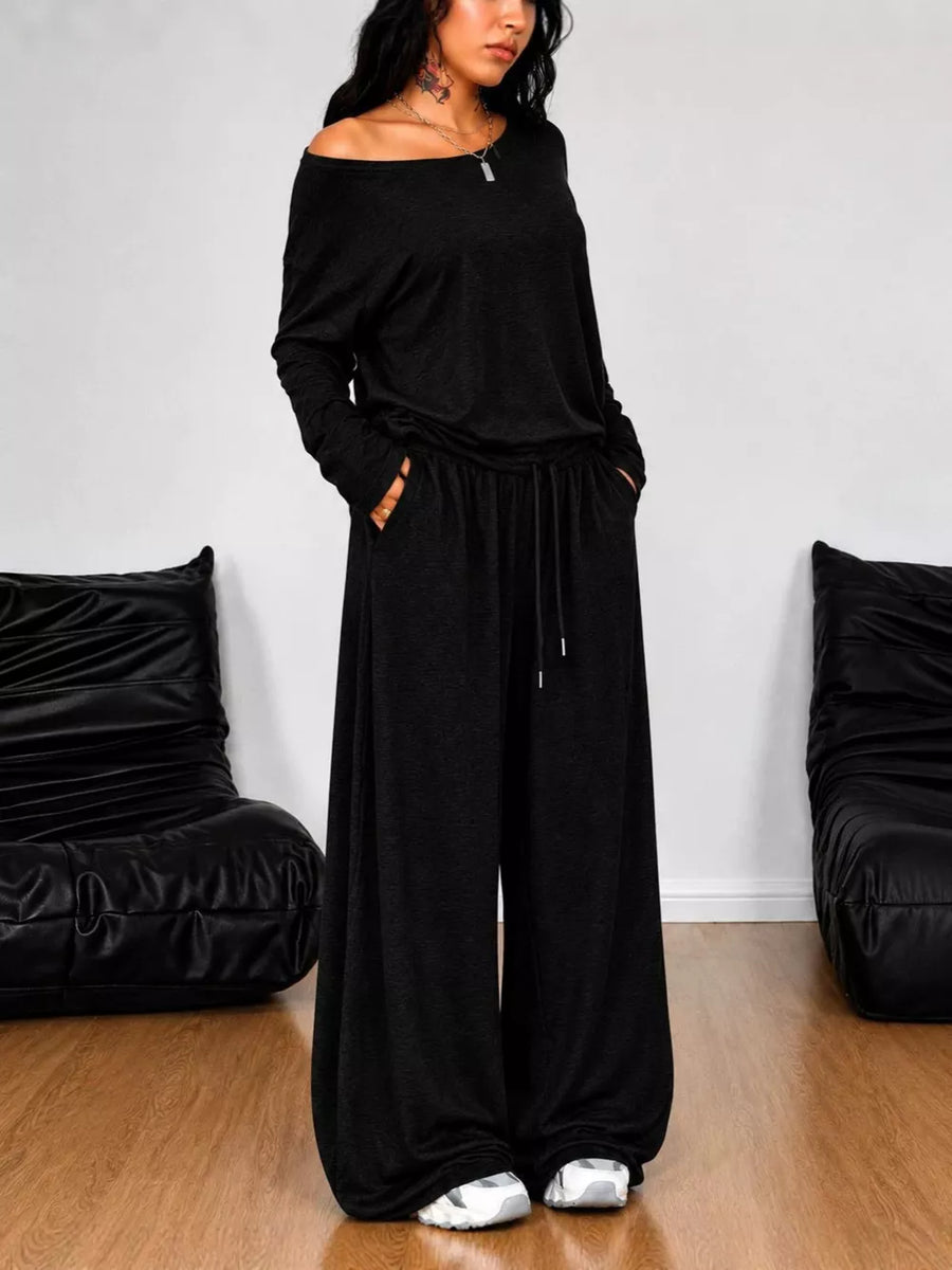 light gray lounge set with hip-length top, full-length pants and drawstring