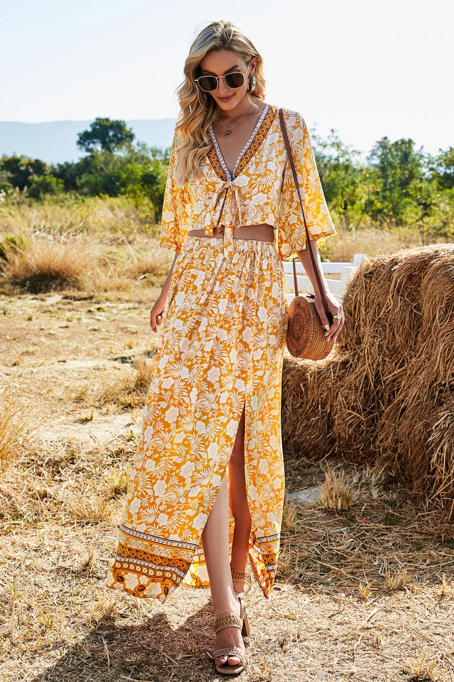 Bohemian floral crop top with tie front and maxi skirt with high slit in tangerine.