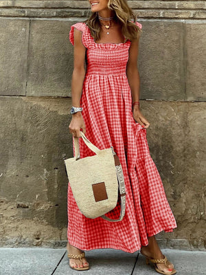 Ruffled sleeve maxi dress in red gingham with smocked bodice and tiered skirt.
