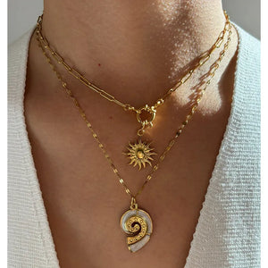 necklace in gold featuring layered and jewelry fit