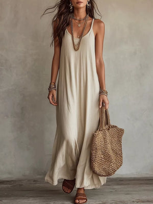 maxi dress in beige featuring spaghetti strap and loose fit