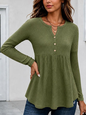 Beige peplum top featuring waffle-knit and waffle-knit