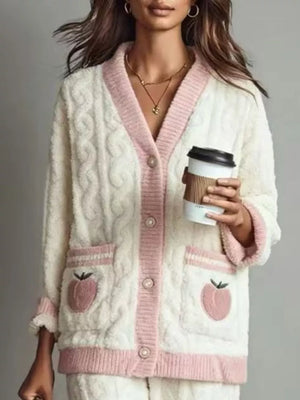 blush pink lounge set featuring buttoned and cable knit