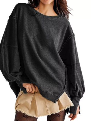 100% polyester Care instructions: Machine wash cold sweatshirt in Cerise with oversized silhouette