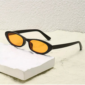 PC Frame material: Polycarbonate Lens material: Polycarbonate Temple material: P sunglasses in Black with oval silhouette