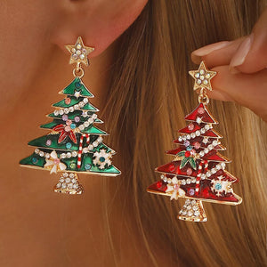 Enchanted Holiday Tree dangle earrings in red and green with rhinestone details and a star topper.