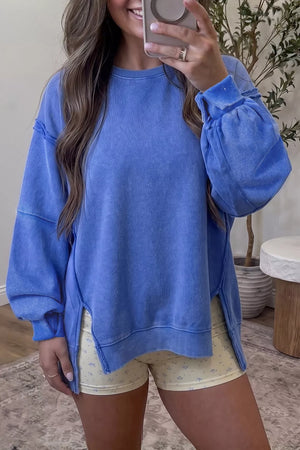 100% polyester Care instructions: Machine wash cold sweatshirt in periwinkle blue with loose silhouette