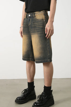 Two-tone washed denim bermuda shorts in olive brown with a faded effect.