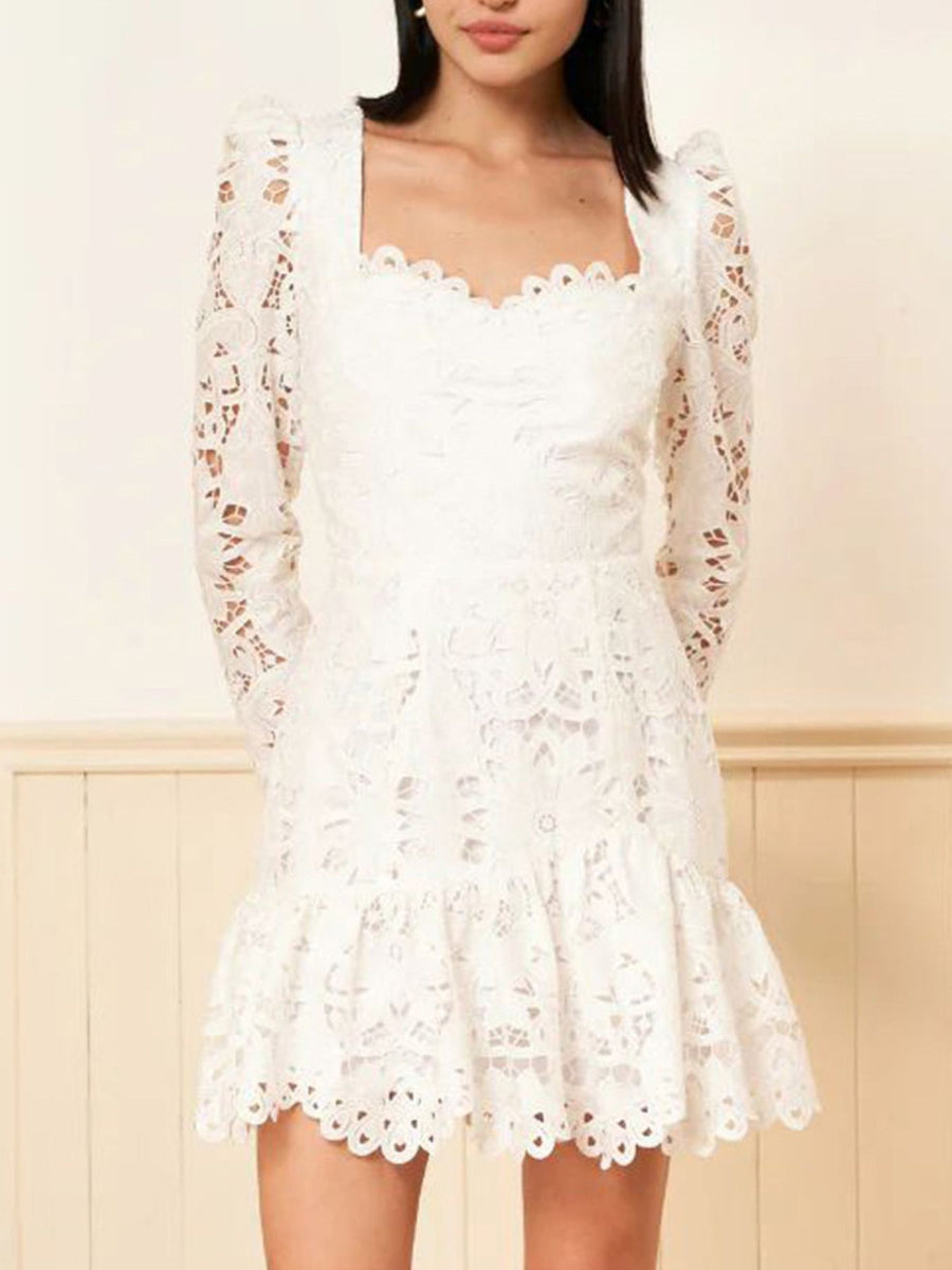 White mini dress featuring lace and floral