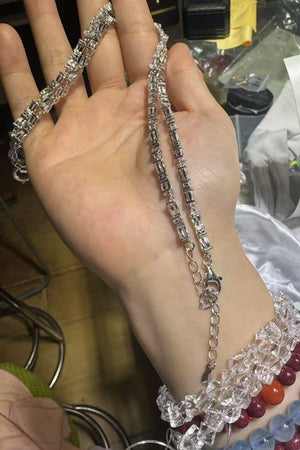 Silver chain necklace with clear baguette-cut stones