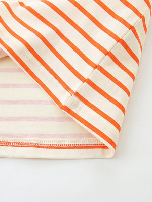 Baby cotton tee with orange and cream stripes, crew neck, and ruffle sleeves.