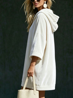 100% polyester Care instructions: Machine wash cold hoodie dress in Pastel Yellow with relaxed silhouette