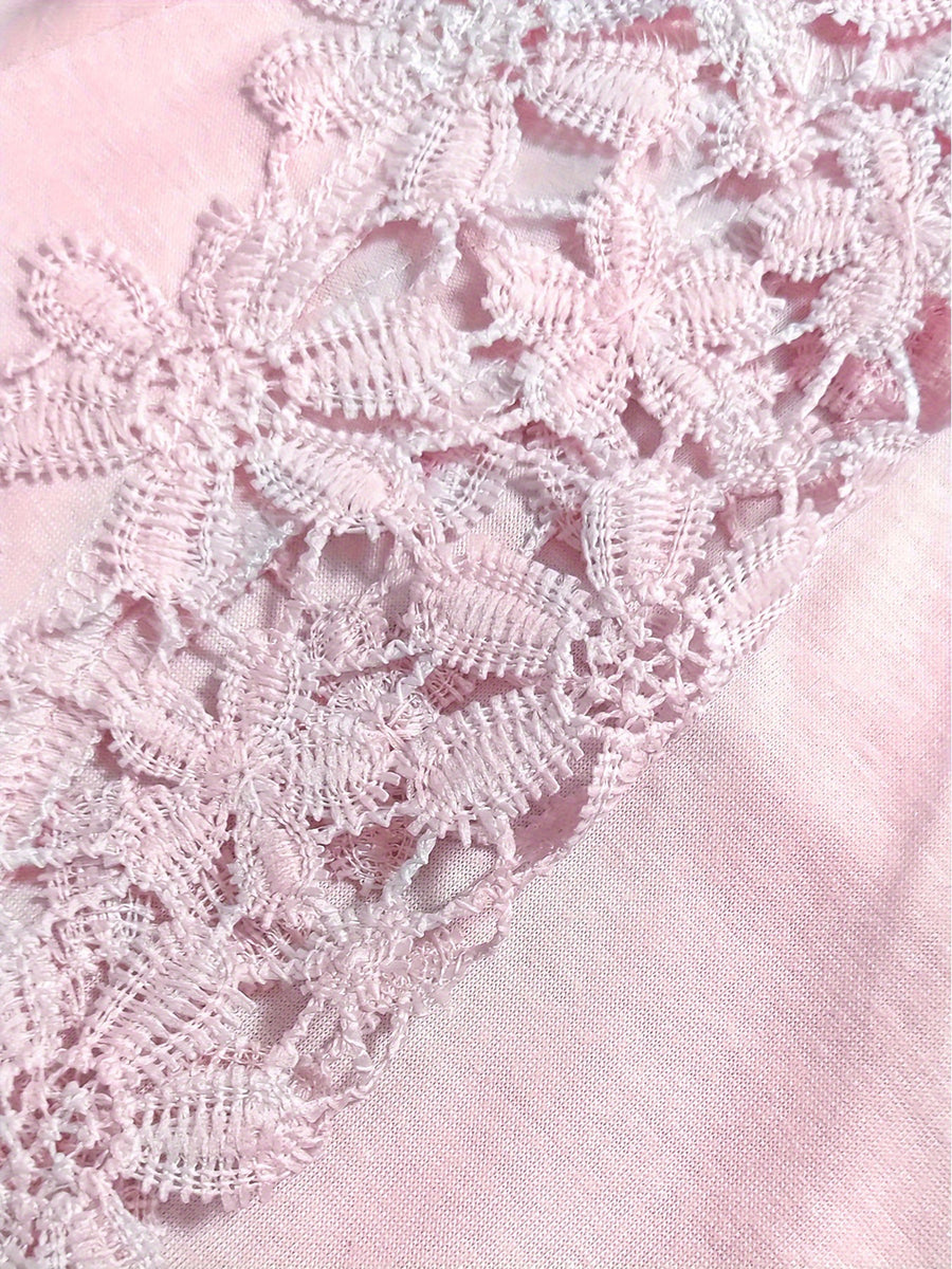 Blush pink blouse with delicate lace yoke and sleeve detail.