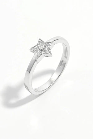 Silver ring with a diamond-encrusted star design
