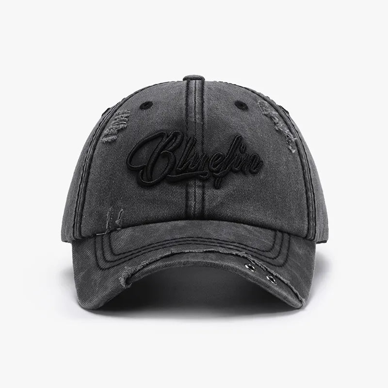 Gray distressed cotton baseball cap with embroidered logo and frayed details